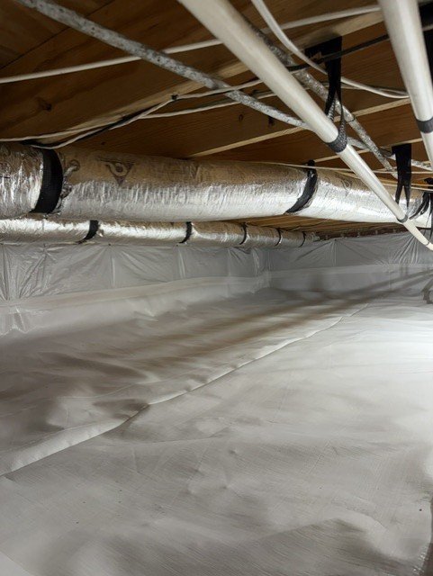 Insulated HVAC ducts and vapor barrier in encapsulated crawlspace