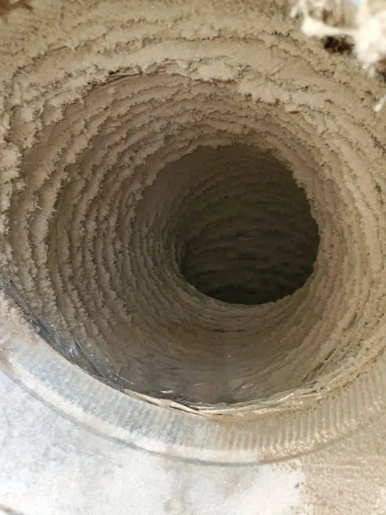 Ventilation duct with clean, textured interior surface.